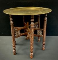 A Moroccan Brass topped folding table, 56cm x 39cm