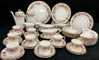 A Royal Worcester ‘Royal Garden’ table service for eight including; eight dinner plates, eight