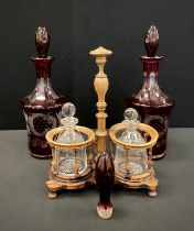 A pair of 19th century Bohemian ruby flashed glass decanters and stoppers, decorated with