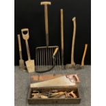 Vintage tools - a beet fork, bill-hook, long-handled hedger, sickle, axe, etc.