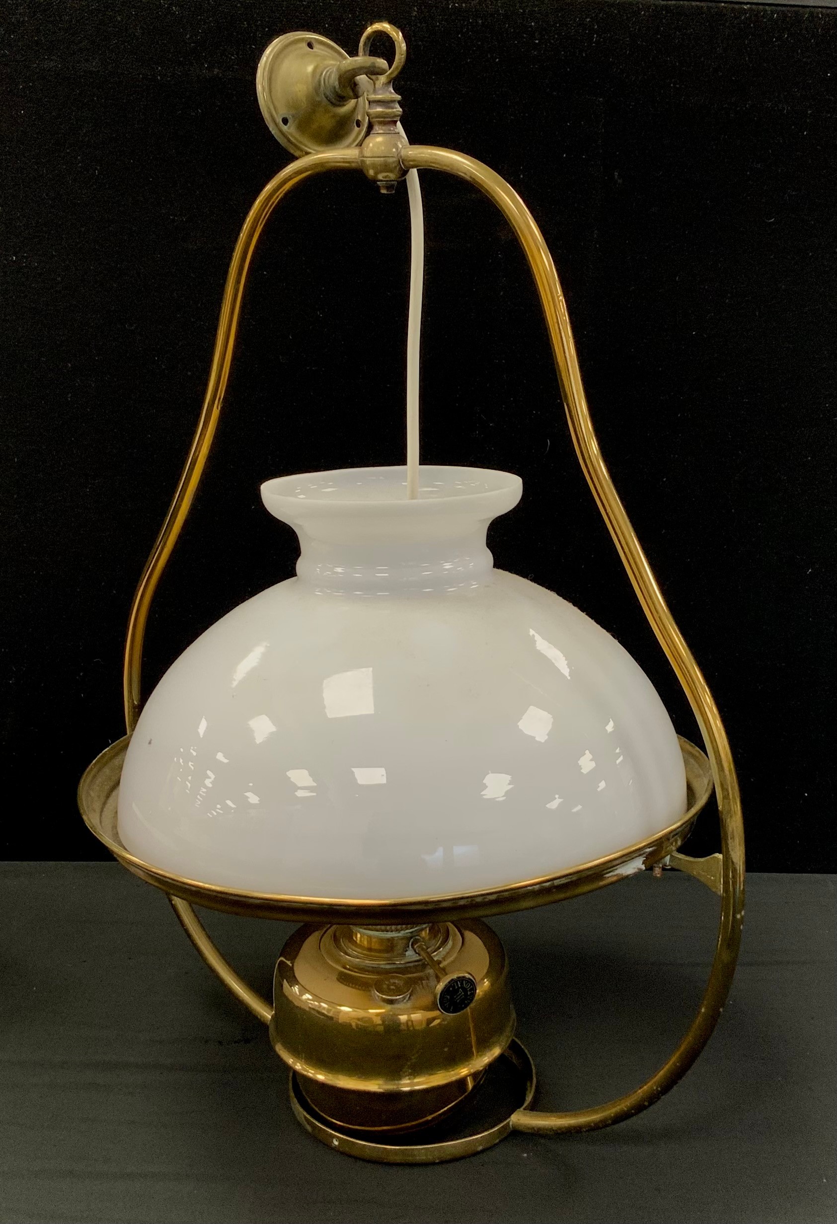 A late Victorian brass hanging oil lamp, 78cm high.