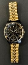 An Acurrist black and gold chronograph wristwatch, fixed bezel, black dial, raised white baton