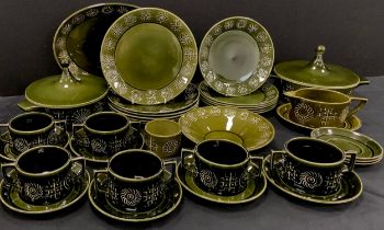 A Portmerion green Totem pattern dinner service for six including; dinner plates, smaller side