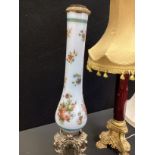 A late Victorian hand painted milk glass lamp stand, silver metal baroque style base, 62cm high; a
