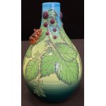 A Sally Tuffin Dennis China Works limited edition bottle vase, tube lined and relief decorated