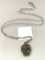 A gothic revival diamond skull pendant necklace, pave encrusted with rose and mixed old cut