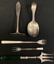 An Edwardian nephrite Jade handled silver three prong fork, spotted deep green Nephrite jade arch