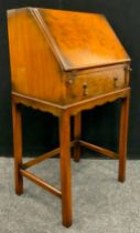 An early 20th century walnut bureau, of small proportions, 102cm high x 53cm wide x 39cm deep, c.