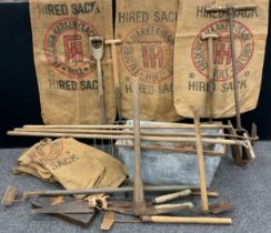 Vintage tools and advertising - four large hessian Sacks, ‘Frederick Harker, Sack Hire’; mattock,