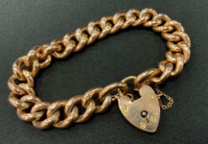 A 9ct gold hollow curb link bracelet, padlock clasp, 26.6g