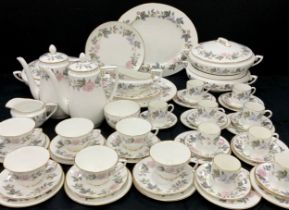 A Royal Worcester ‘June Garland’ table service for six including; three lidded tureens, six tea cups