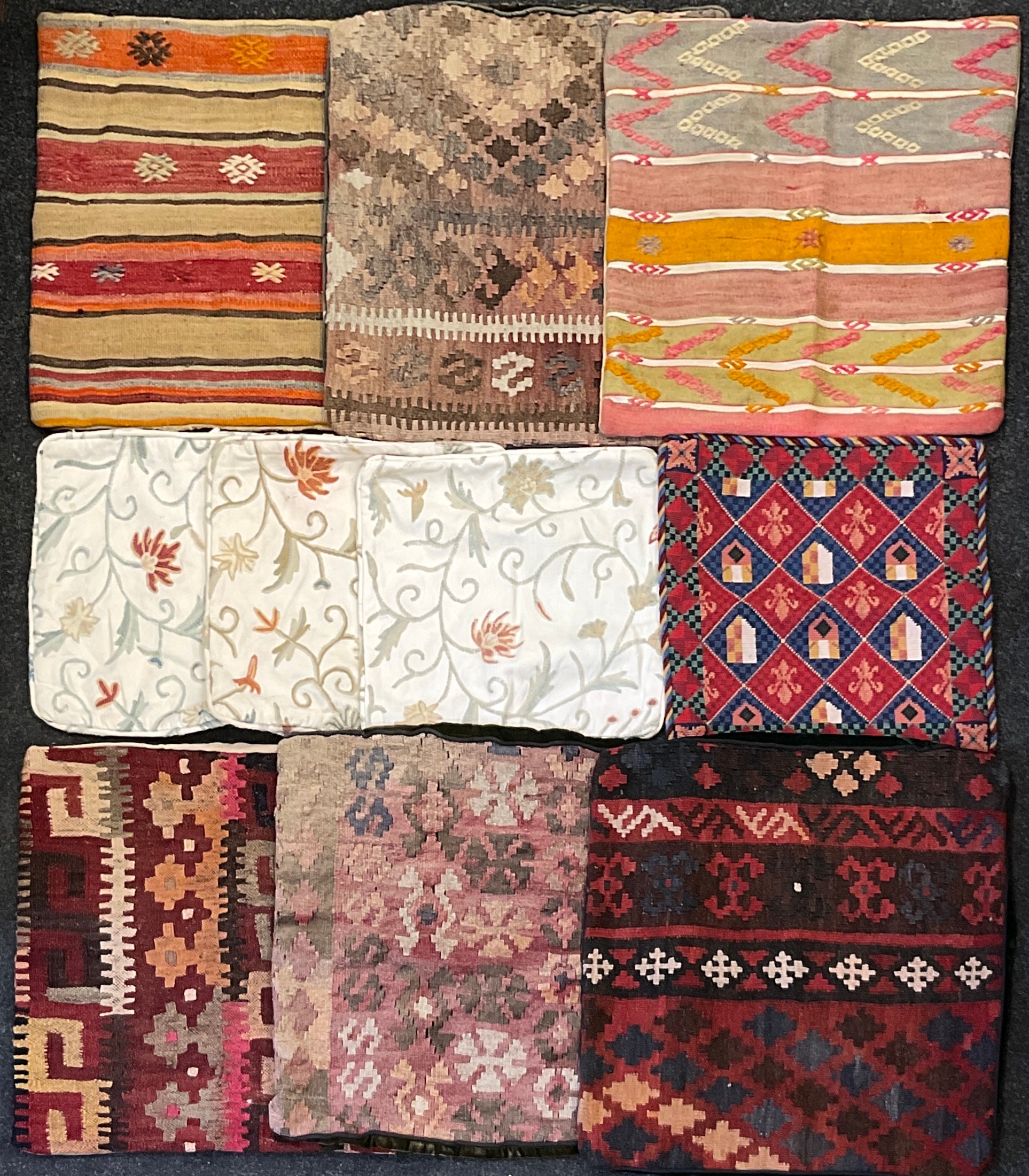Textiles - six Persian Kilim pillow cases, each in different colours and patterns with geometric and