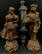 A pair of plaster figures, bronze effect of ‘Maiden and Working Man’, 50cm high; a bronzed effect