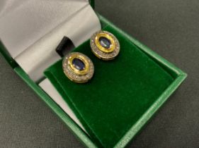 A pair of sapphire and rose cut diamond oval stud earrings, yellow and white metal mounts, total