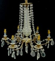 A 20th century glass and gilt metal six branch chandelier, pressed glass centre, cut glass droplets,