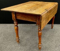 A George III oak plank-top, drop- leaf, kitchen table, 73.5cm high x 109.5cm x 63cm (106cm with