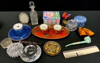 A Maling oval inkstand with inkwells, decorated in the chinoiserie style with a black and gold