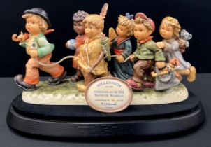 A Hummel Goebel limited edition figure group of ‘Worldwide Wanderers’, No.452/2000, marks the