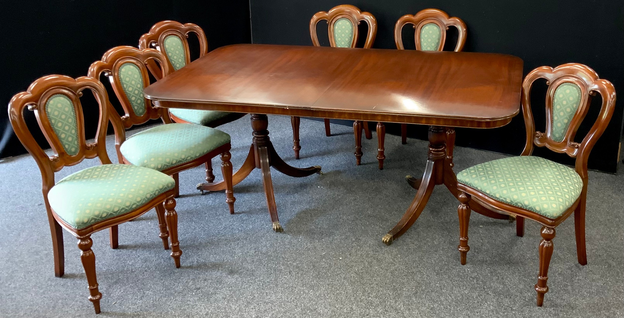 A mahogany regency style D-end dining table by Reprodux furniture, and a set of six mahogany