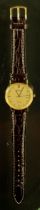 A 9ct gold cased Geneve gold cased wristwatch, gilt dial, block baton markers, quartz movement,