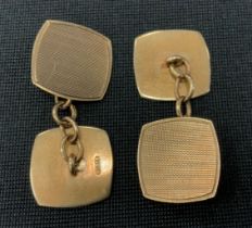 A pair of 9ct gold engine turned panel cufflinks, 5g gross