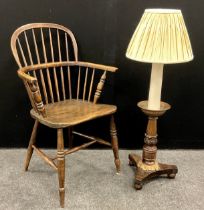 A Windsor stick back arm chair, turned fore legs, H stretcher; a Rosewood pole screen base, later