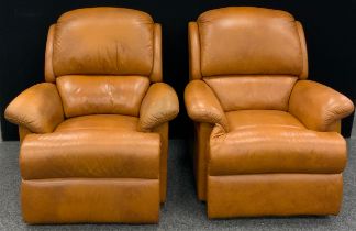 A pair of tan leather armchairs, by Sherbourne, one a manual recliner chair, (2).