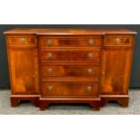 A mahogany break-centre side cabinet / hall table, four graduated drawers to centre, with a short