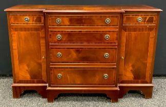 A mahogany break-centre side cabinet / hall table, four graduated drawers to centre, with a short