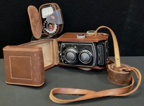 A Rollei Rolleicord IV Model Medium Format TLR Camera, c.1953-54, serial no.1354399, with a