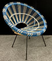 Attributed to Janine Abraham & Dirk Jan Roi, a 1950s basket weave plastic and metal lounge chair,