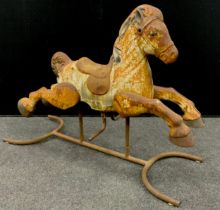 A French pressed metal Rocking Horse, 75.5cm high x 99cm x 38.5cm.