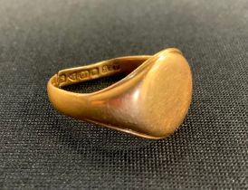 An 18ct gold signet ring, cut, 5.8g