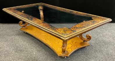 Interior design - a neo-classical design glass-top coffee table, with carved ‘cornucopia’ shaped