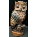 A large mahogany carving, of an owl, 44cm high