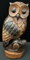 A large mahogany carving, of an owl, 44cm high