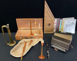 Musical Instruments - A Julian Goodachre bagpipe, Hohner accordion, parade trumpet, music sheets;