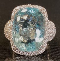 A certified Aquamarine and diamond ring, central mixed cut cushion aquamarine 14.50ct, surrounded by