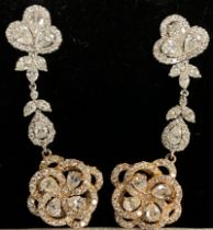A pair of certified diamond chandelier 18ct rose and white gold drop earrings, set with two