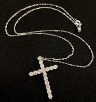 A diamond cross pendant necklace, set with sixteen certified round brilliant cut diamonds, total