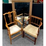 A George III inlaid walnut elbow chair, (requiring some repair); an Edwardian stained beech and