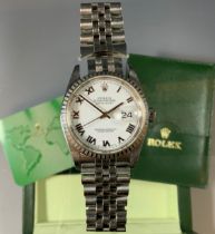 Rolex - a stainless steel Oyster Perpetual Date Just Superlative Chronometer wristwatch, ref 2080,