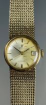 Omega - a lady's 1061 automatic 9ct gold cased bracelet watch, silvered dial, block baton markers,