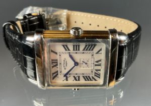 A Rotary Revelation quartz dual-faced wristwatch, revolving reversable case, black rectangular dial,