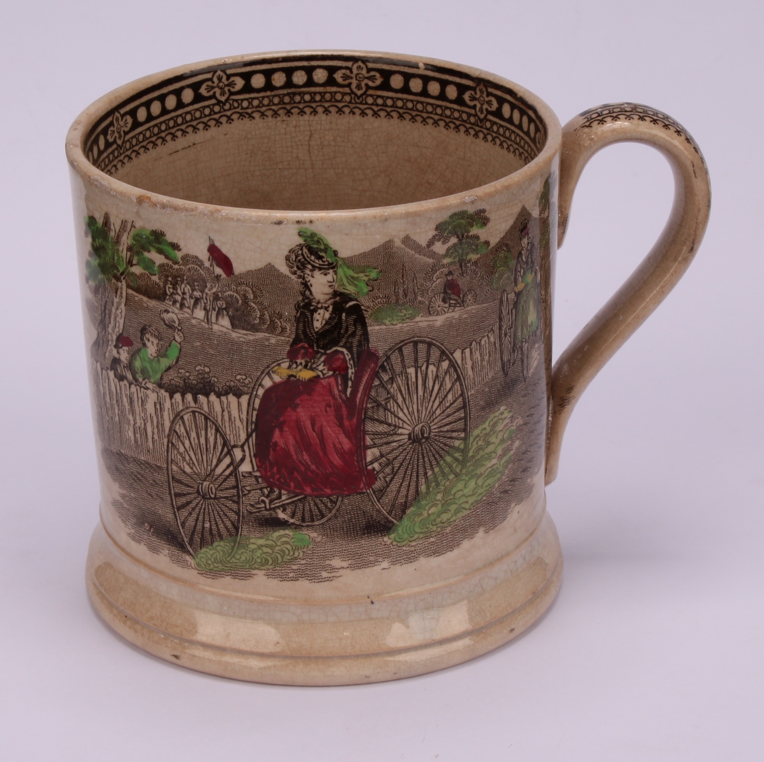A 19th century Staffordshire mug, Bicycle, printed in sepia tones picked out in green, yellow and - Bild 2 aus 5