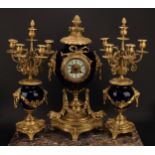 A late 19th century French gilt metal and porcelain clock garniture, 8cm circular dial inscribed