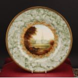 A Coalport shaped circular plate, painted by Malcolm Harnett, signed, with a view of Salisbury