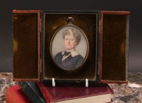 A late 19th century oval portrait miniature on ivory, lady with blue dress and white lace collar
