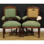 A pair of late Victorian walnut club elbow chairs, by James Lamb (1840-1899), one stamped LAMB