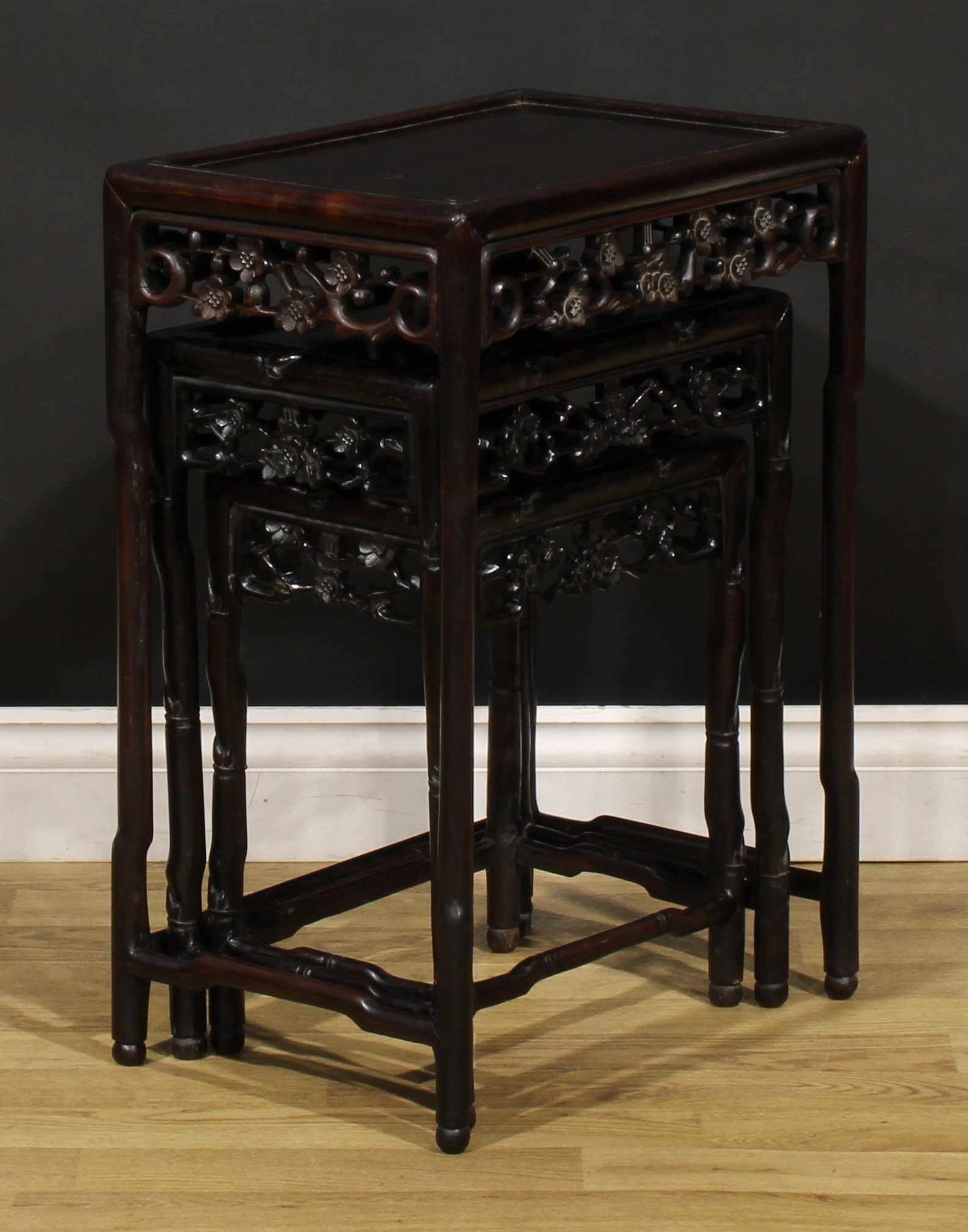 A Chinese hardwood harlequin nest of three occasional tables, each with a rectangular panel top, - Image 4 of 5